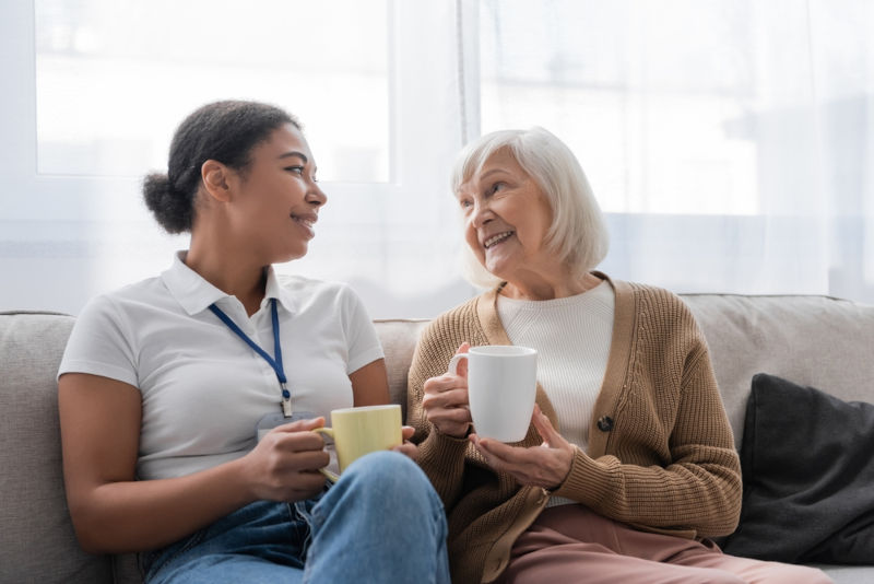 A clinical social worker sharing a casual tea break with her client.