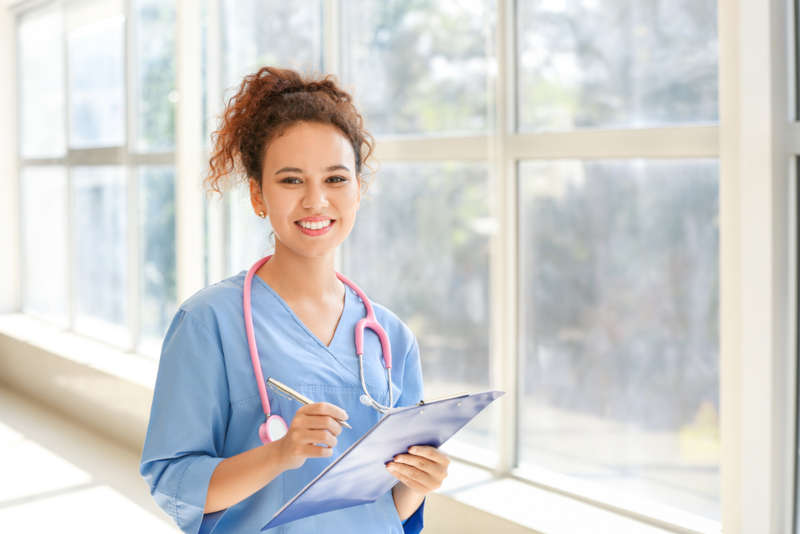 a registered nurse smiling for the camera