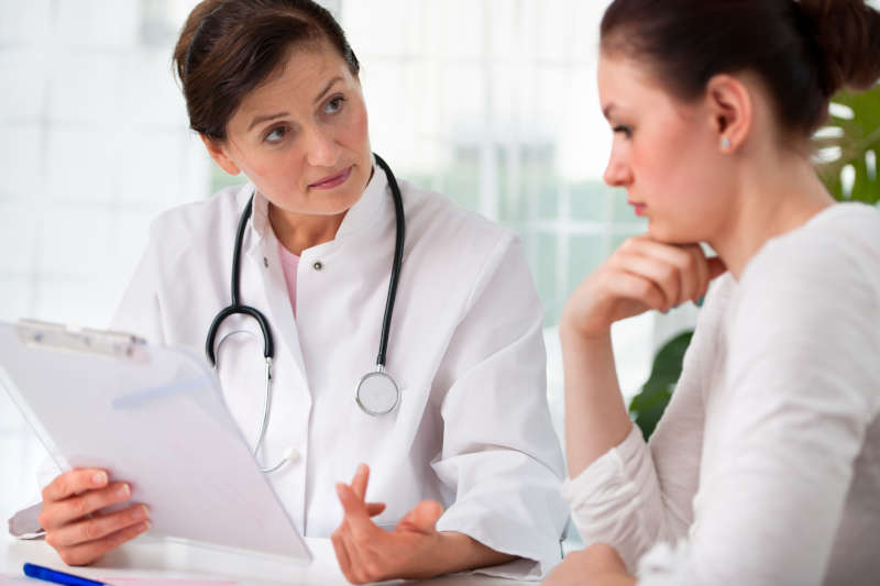 A PMHNP discussing a treatment plan with a patient