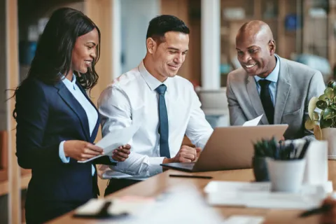 A director of BI consulting with colleagues.